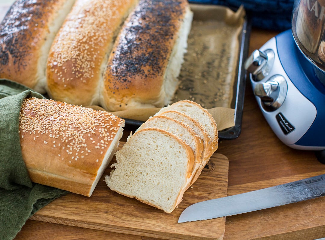 A loaf of bread sitting on top of a cutting board.