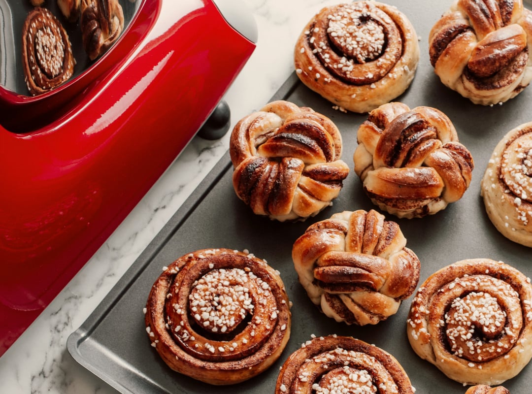 Cinnamon buns on a baking tray