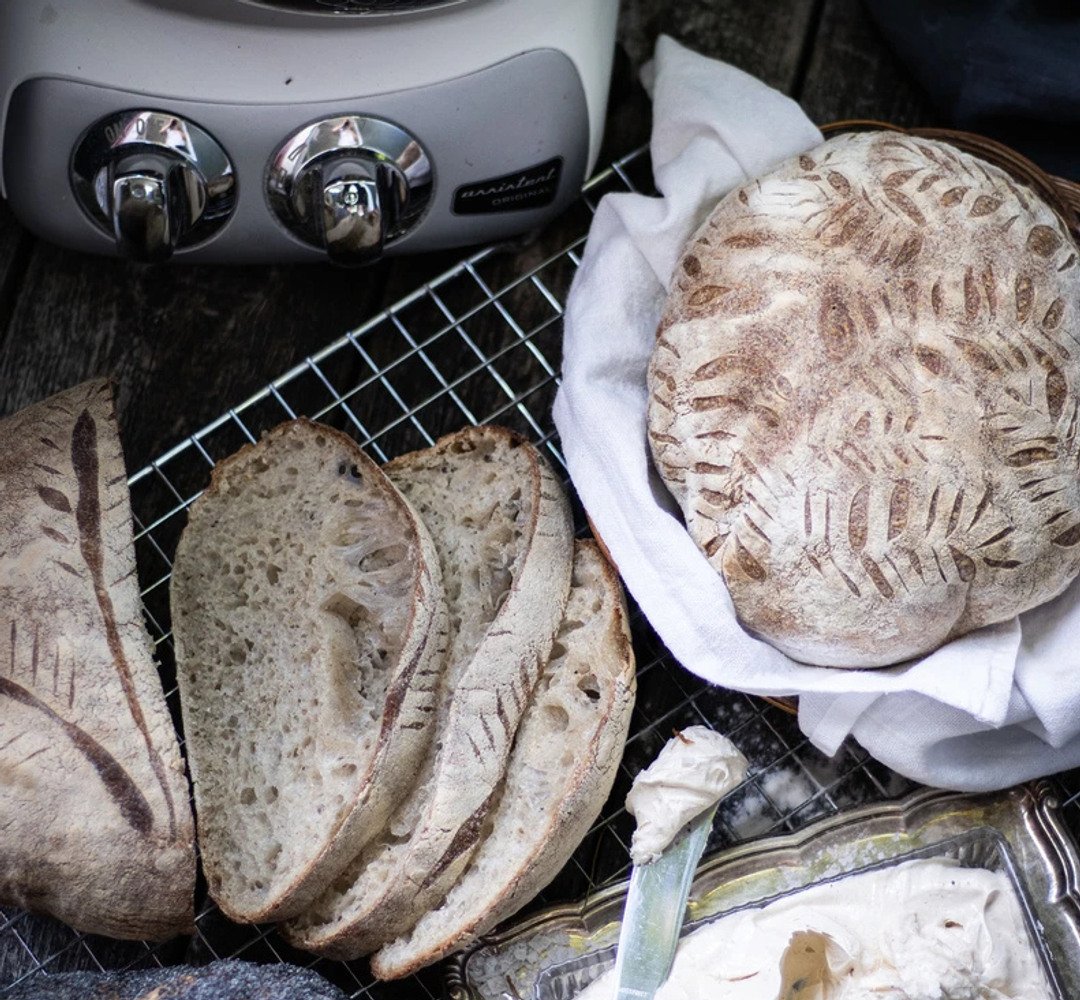A bunch of bread that is on a rack.