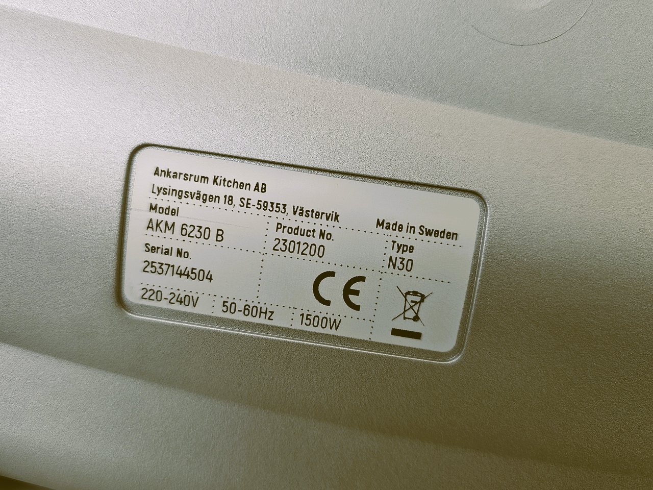 A close up picture on a serial number plate.