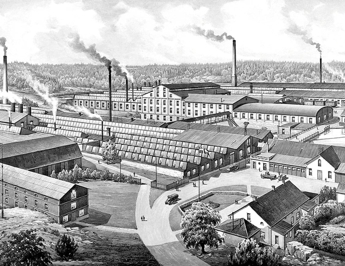 Historisk illustration av Ankarsrum industri, som visar fabriksbyggnader, rykande skorstenar och arbetarfaciliteter omgivna av den svenska landsbygden.