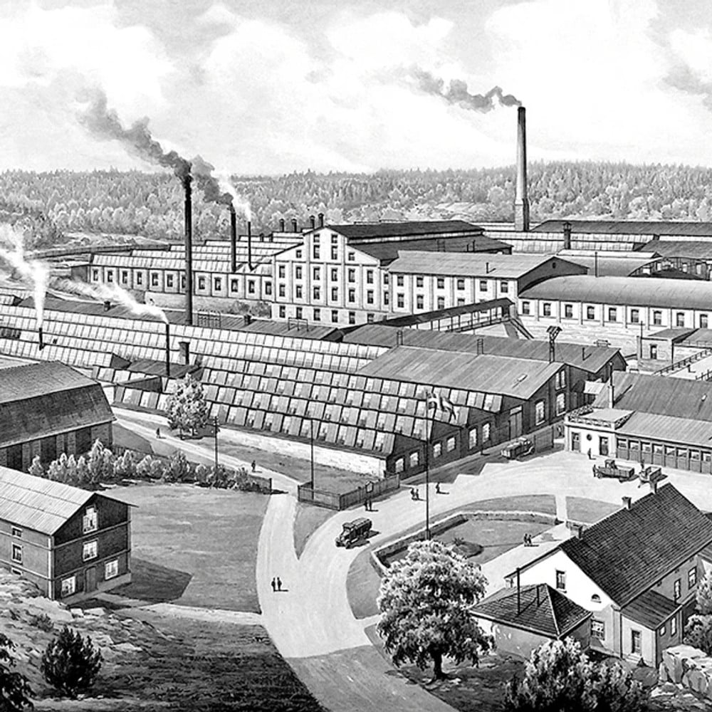 Historic illustration of the Ankarsrum industrial works, showing factory buildings, smoking chimneys and workers’ facilities surrounded by the Swedish countryside.