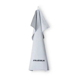 Grey kitchen towel with the Ankarsrum name printed in black.