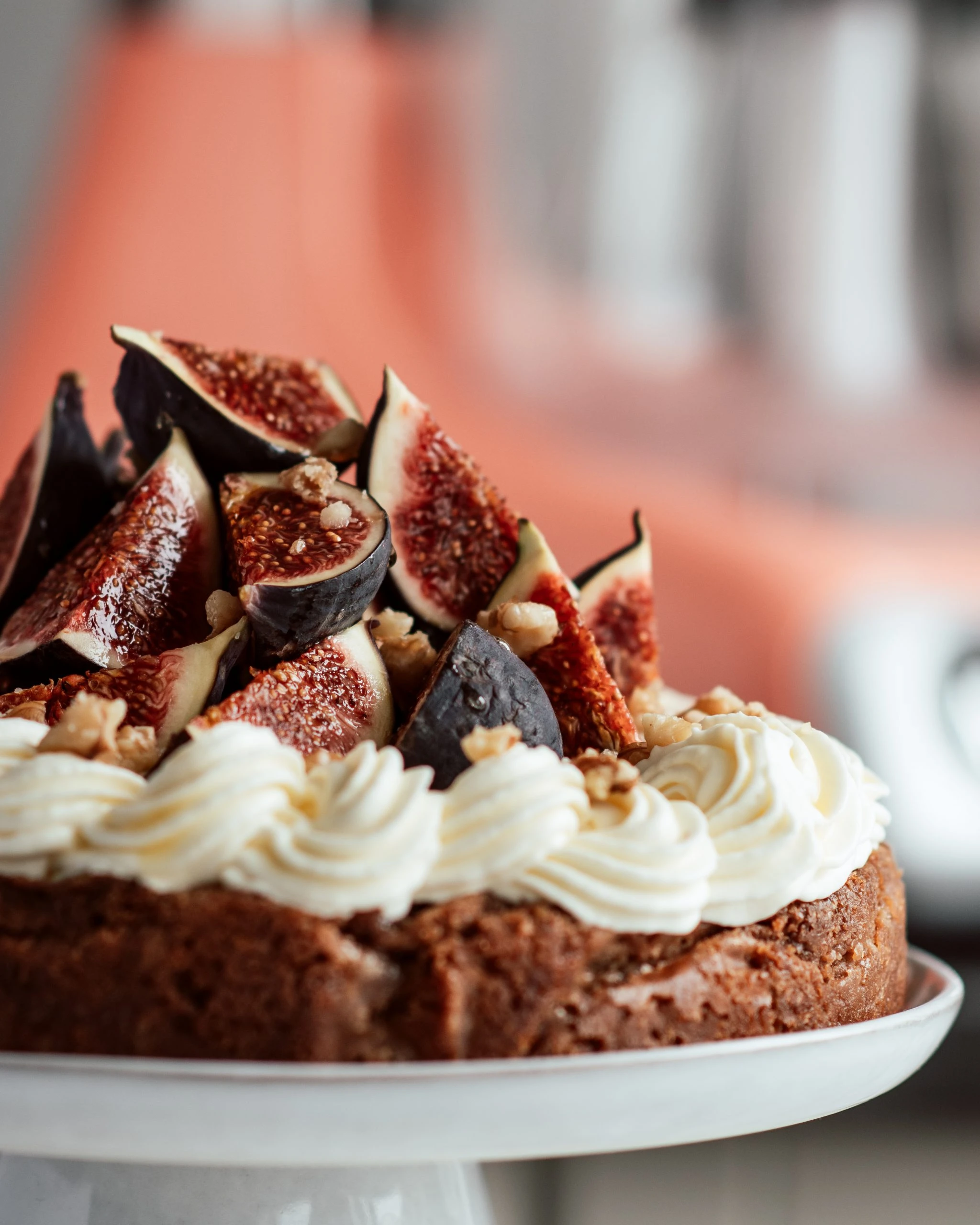 a picture of a walnut cake with figs