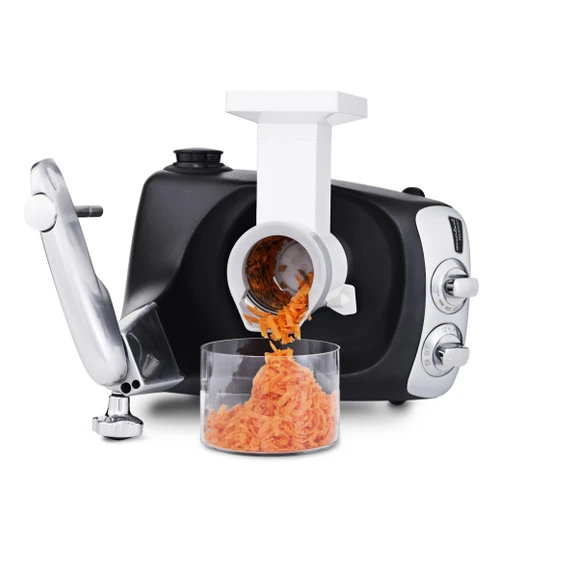 Ankarsrum Assistent Original with the Vegetable Cutter attached, slicing carrots.