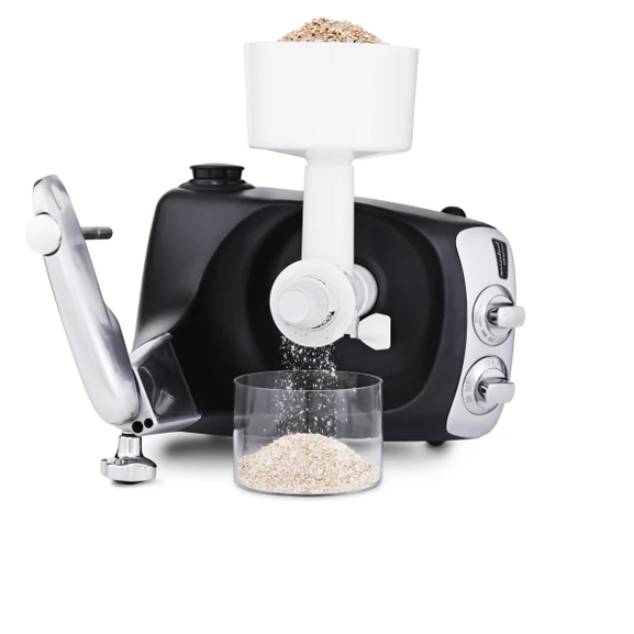 Ankarsrum Assistent Original with the Grain Mill attached, grinding grain into flour.